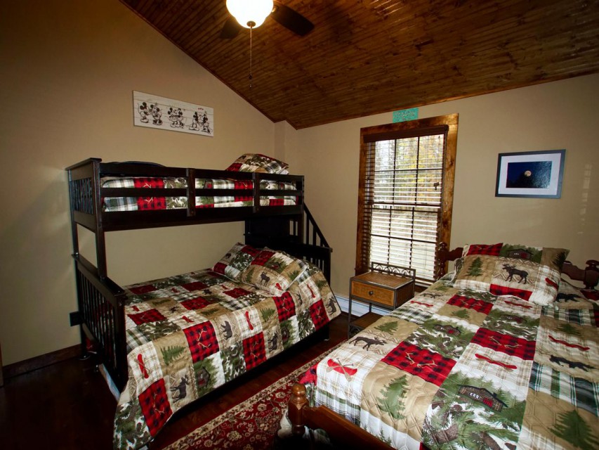 Bedroom with twin bed and bunk bed with twin/full