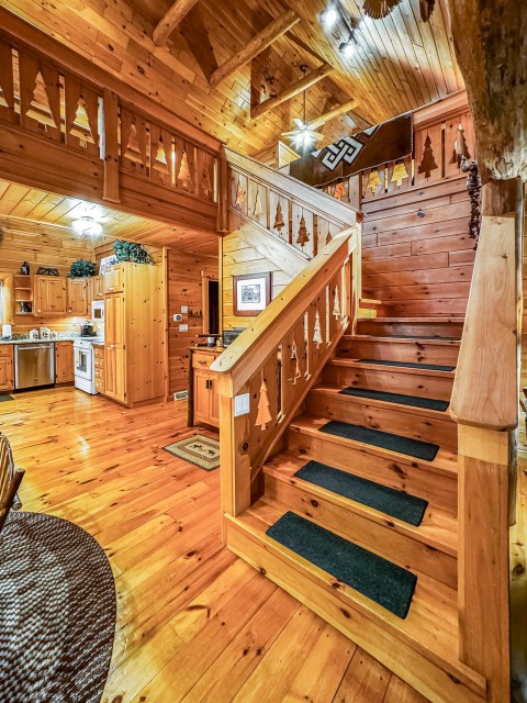 Knotty Pine Staircase Landing to Open Loft