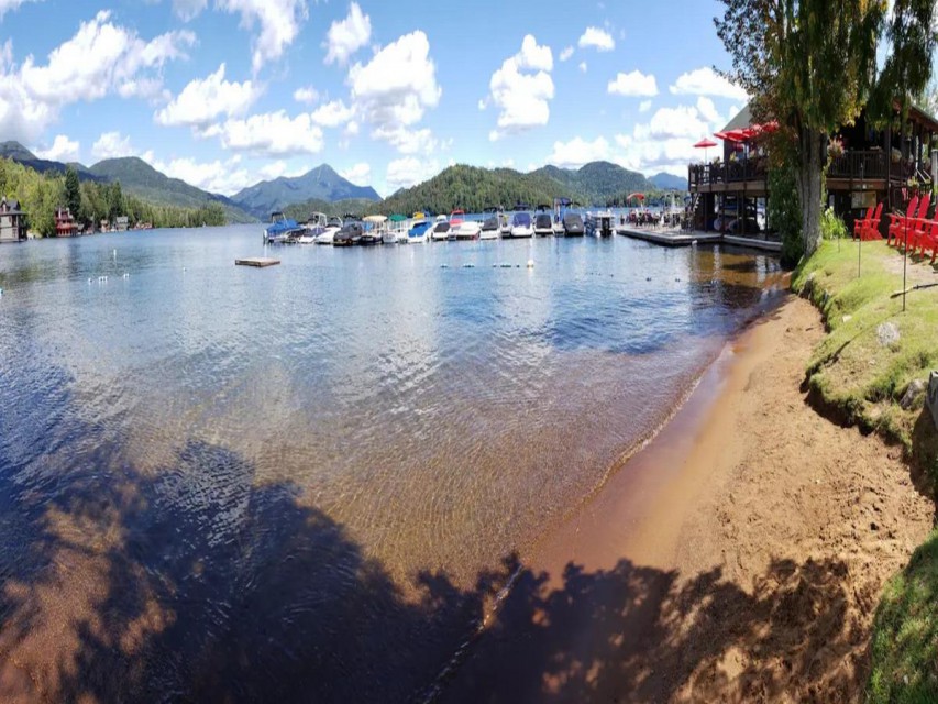 Beach at club w/waterfront dining and marina