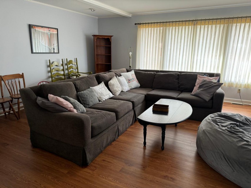 Living room off hallway/streaming TV wall. 