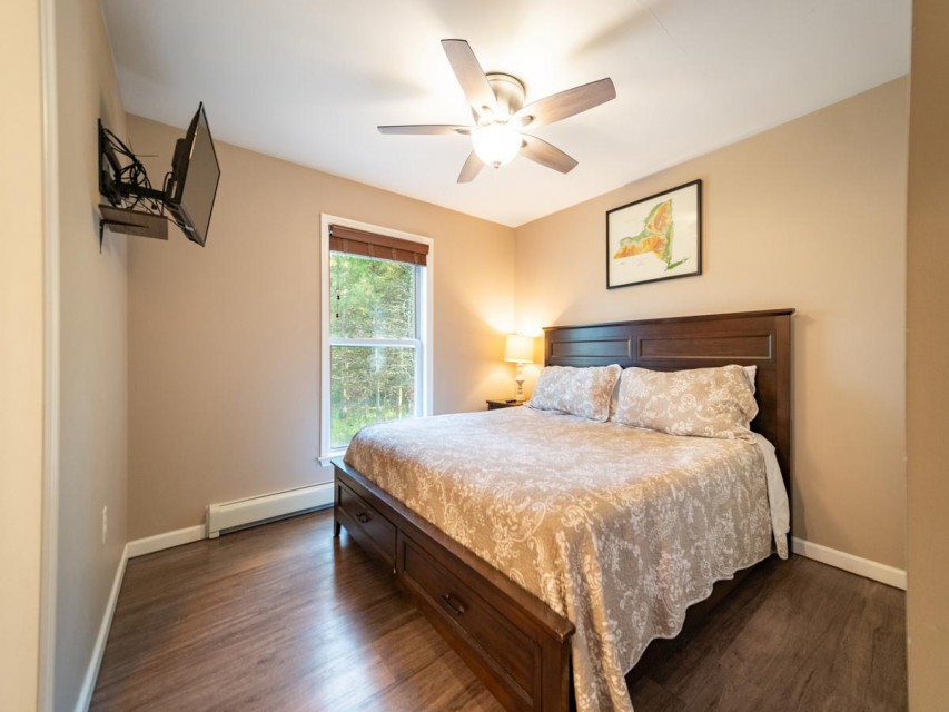 Main floor Primary Bedroom with king bed.