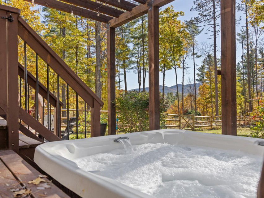 Take in picturesque mountain views in a hot tub for 5.