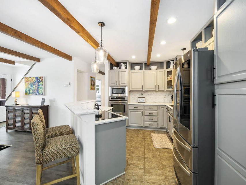 The open-plan kitchen allows for easy conversation.