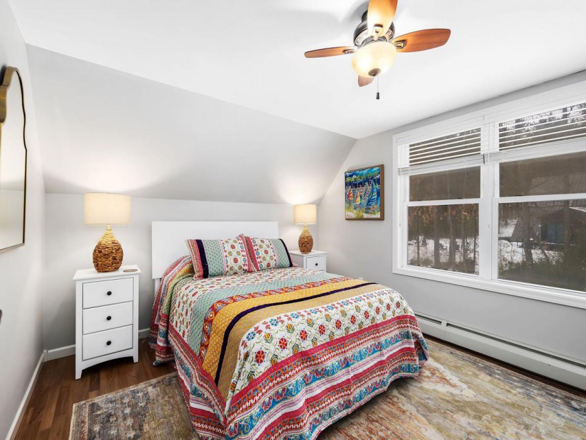 Bedroom 2 on the 2nd floor features a queen bed.