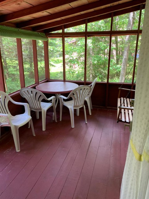 The jewel of Wind Song:  The screened porch