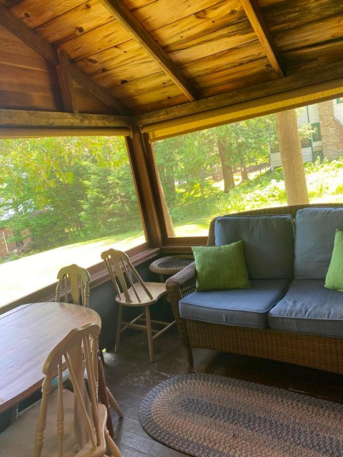 Relax on the screened porch over looking Cranberry Lake
