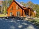 IMMACULATE LINCOLN LOG CABIN ON 3.2 ACRES 